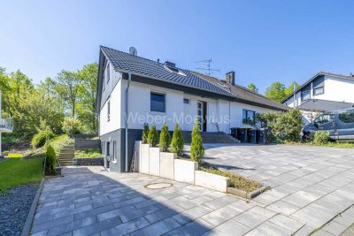 Modernisiertes Einfamilienhaus mit ELW, 2 Terrassen + Garten in Zentrumslage