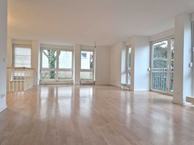 Attraktive Wohnung im EG mit Garten