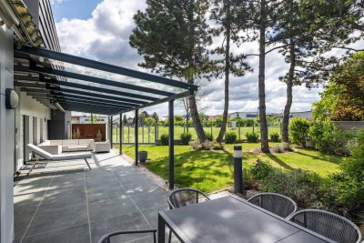 Blickfang mit Privatsphäre! Außergewöhnliches Designerhaus mit viel Raum zur Entfaltung | 9 Zimmer, Edelstahlpool, Sauna, Weinkeller | Vereint Wohnen und Arbeiten | Barrierefrei