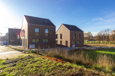 Erstbezug: Freistehender Familientraum in grüner Lage direkt an der Haard!