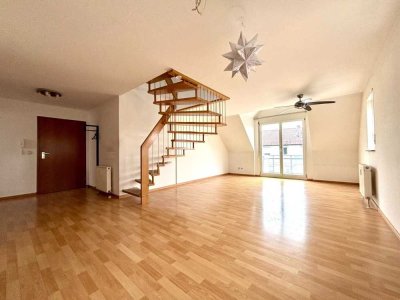 Attraktive Maisonette-Wohnung - modern, zentral und mit Balkon, Außenstellplatz und Garage