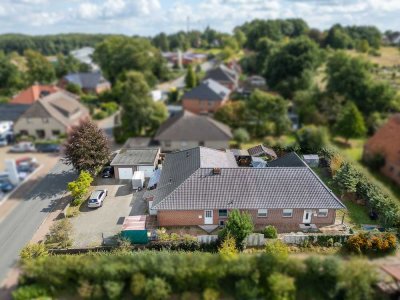 Solider Mietbungalow mit 3 Wohnungen, Garten und Garagen | zentral in Syke-Barrien