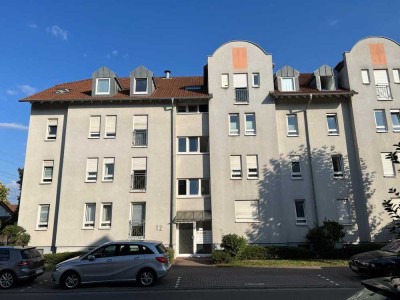 Charmante 2-Zimmer-Erdgeschosseigentumswohnung mit  Terrasse, Gartenanteil und Tiefgaragenstellplatz