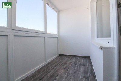 Direkt bei der Brigittapassage und Höchstädtplatz- Renovierter Wohntraum mit WINTERGARTEN und Ausblick! Befristet vermietet