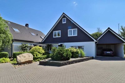 Moderne Doppelhaushälfte aus 1992 mit Wintergarten & Gartenparadies in Neuenkirchen