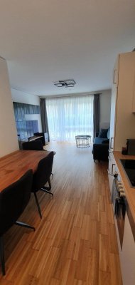 2-Zimmer-Gartenwohnung mit 13 m² Terrasse, 59 m² Garten &amp; Tiefgarage – optional Kreditübernahme (1,375 % Fixzins)