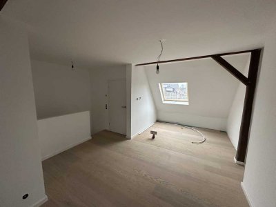 Ihr neues Zuhause: Exklusives Dachgeschoss-Apartment mit Fußbodenheizung/-kühlung