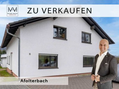Charmantes Zweifamilienhaus mit Werkhalle und großem Grundstück
