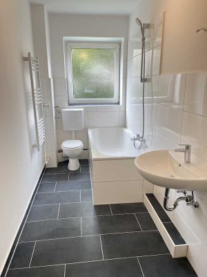 Erdgeschosswohnung mit Balkon