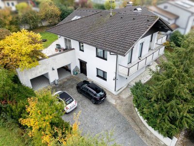 Großzügiges Familienhaus mit Einliegerwohnung, Garten &amp; Kamin!
