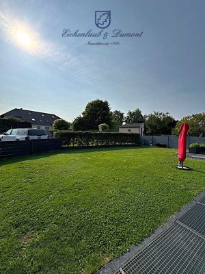 Großzügige Wohnung mit EBK, eigenem Eingang, Garten & 2 Stellplätzen