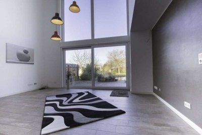 Exklusives Wohnerlebnis: Modernes Einfamilienhaus mit traumhaftem Garten und Schwimmteich