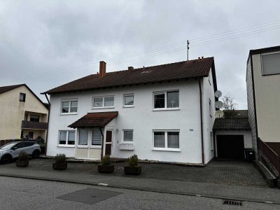 Erdgeschosswohnung mit Ternasse, Garten und Garage