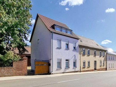 2 Mehrfamilienhäuser mit großzügigem Grundstück und Nebengelass