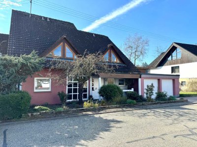 Großzügiges Einfamilienhaus mit ELW und traumhaftem Garten!