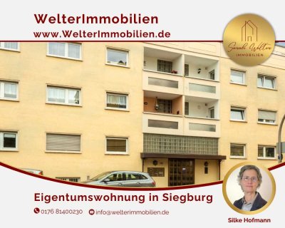 Attraktive Etagenwohnung mit zwei Balkonen und Garage mitten in der Stadt