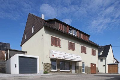 Wohn- und Geschäftshaus mit 3 Garagen