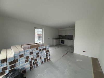 Erstbezug: 3 Zi.-Whg. mit Einbauküche und Süd-Balkon in Taufkirchen (nahe S-Bahn)