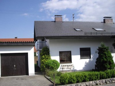 Doppelhaushälfte mit Garage und Garten