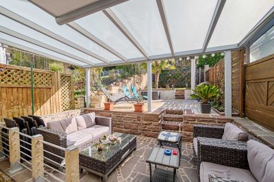 Charmantes Reihenhaus mit Kamin, Klimaanlage und liebevoll gestaltetem Außenbereich