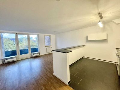 Moderne 2-Zimmer Wohnung mit optisch abgetrennter Küche im Jugendstil