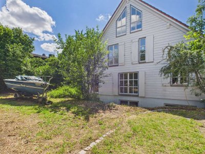 Stilvolle 2-Zimmer-Wohnung mit Wintergarten & Gartenanteil