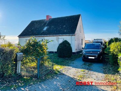 Gemütliches Familienhaus mit vielseitig nutzbarem Grundstück