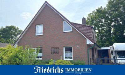 Einfamilienhaus mit Wintergarten und Garagen-/Werkstattgebäude in ruhiger Wohnlage in WST-Ocholt