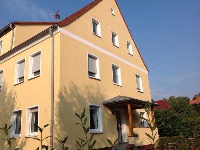 4-Zimmer-Wohnung mit eigenem Gartenanteil