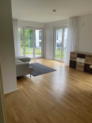 Hochwertige 2-Zimmer-Wohnung mit Hobbyraum im UG und kleinem Garten