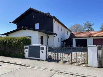 3-Zimmerwohungen im Erdgeschoss einer Doppelhaushälfte mit Garten in Deisenhofen