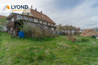 Großzügiges Sanierung‑/Neubaugrundstück mit voll unterkellertem Einfamilienhaus!