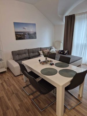 2-Zimmer DG-Wohnung mit Dachterrasse, schönem Ausblick und hohen Decken