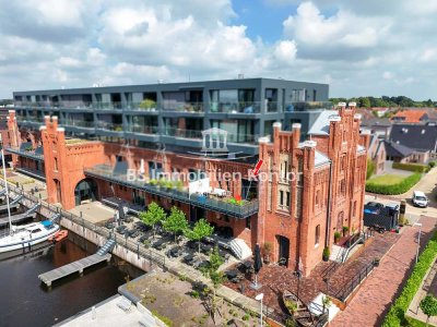 Wohnen am Wasser! Neuwertige Wohnung mit luxuriöser Ausstattung, PKW-Stellplatz und Terrasse mit Was