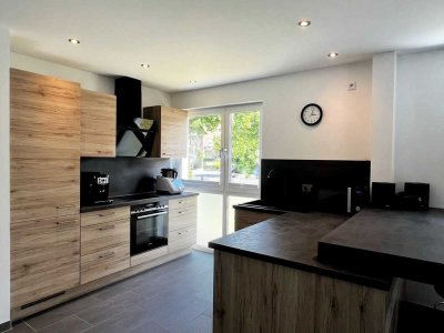 Moderne Erdgeschosswohnung mit Terrasse, Garten und Tiefgaragenstellplatz - Bezugsfrei zum 01.08.25