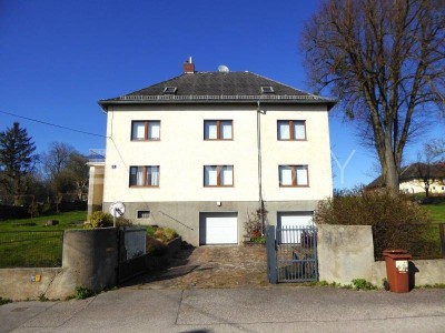 Jede Menge Platz und Potential auf 2 Etagen - 2 Garagen, Werkstatt....