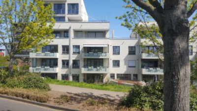 Wohnen am Rhein: moderne 3-Zimmer-Wohnung, 2 Bäder, Einbauküche, Terrasse und Tiefgaragenstellplatz