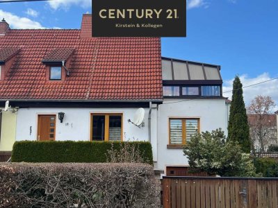 Liebevoll gepflegte Doppelhaushälfte mit Wintergarten, Dachterrasse und Tiefgarage!