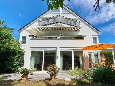 Helle EG-Wohnung mit eigenem Garten, zwei Terrassen und zwei TG-Stellplätzen am Steinberg