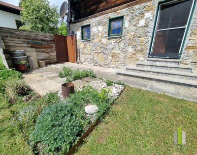 Einzigartige 3-Zimmer-Maisonette mit Garten &amp; Seeblick am Tannberg