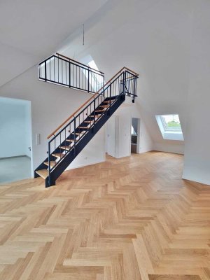 Neubau & Erstbezug! Attraktive 2-Zi.-DG-Wohnung mit Galerie & Dachterrasse in gehobener Ausstattung