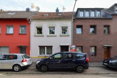 Reihenmittelhaus mit großem Potenzial und Garten in zentraler Lage