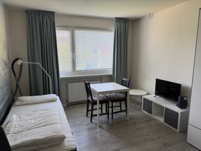 Komplett möbliertes, modernes 1-Zimmer-Apartment mit Gemeinschaftsgarten