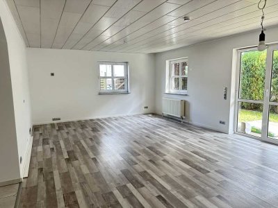 3-ZKB-Wohnung mit Garten, Garage und Tageslichtbad