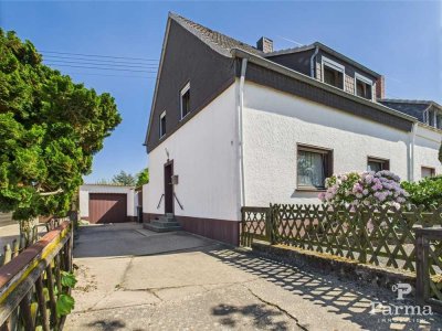 Einfache Doppelhaushälfte mit tollem Grundstück in Zülpich - OT Schwerfen