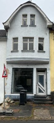 Einfamilienhaus mit Gewerbefläche in Bettingen!