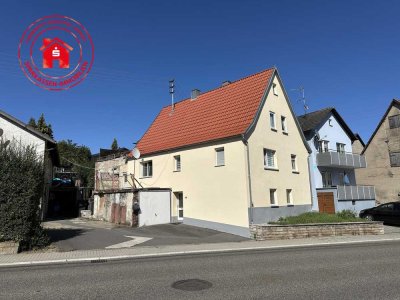 2 Wohnhäuser mit Nebengebäude in zentraler Lage von Unterbalbach