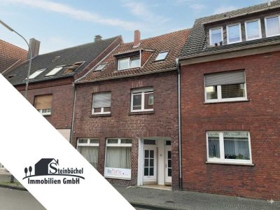 Attraktives Mehrfamilienhaus mit Ladeneinheit und zwei Garagen in gefragter Lage!