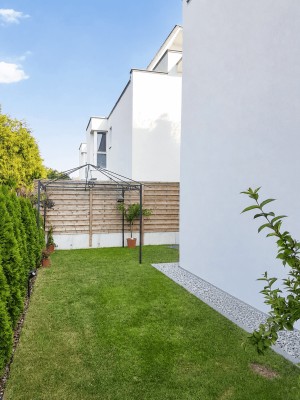 Wohnung mit Eigengarten und Terrasse sowie Tiefgaragenstellplatz