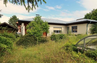 E B R E I C H S D O R F Sanierungsbedürftiger 5 Zimmer Bungalow in ruhiger Siedlungslage